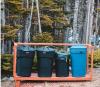 Trash cans awaiting pick up. Photo by Erik McClean, Unsplash.com